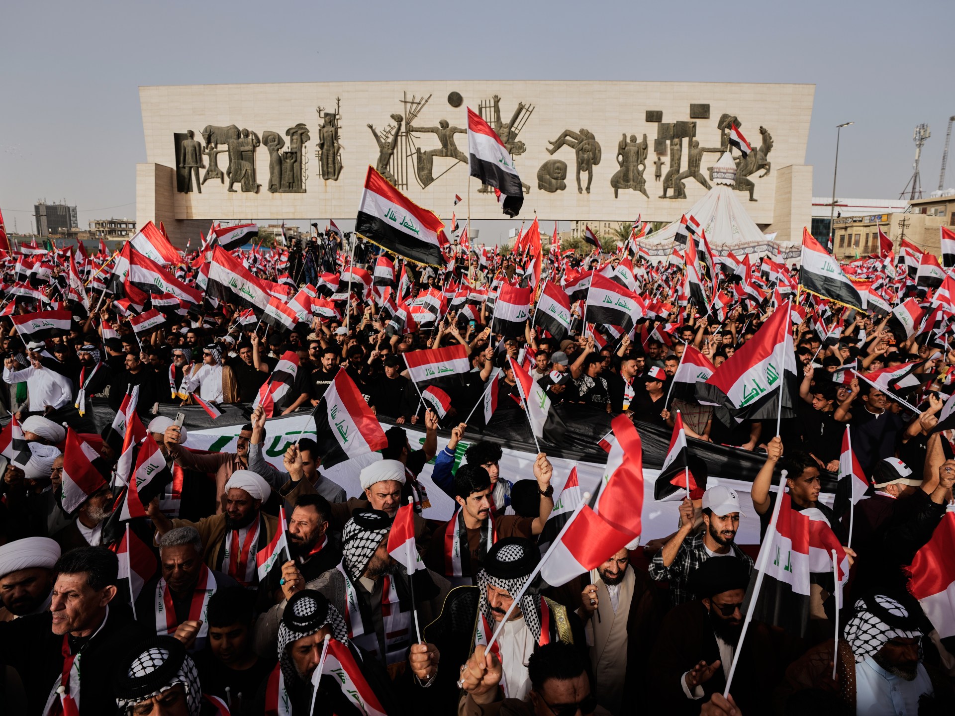 Protesters chant against the US and Israel, urging the global community to confront their actions in the Middle East.